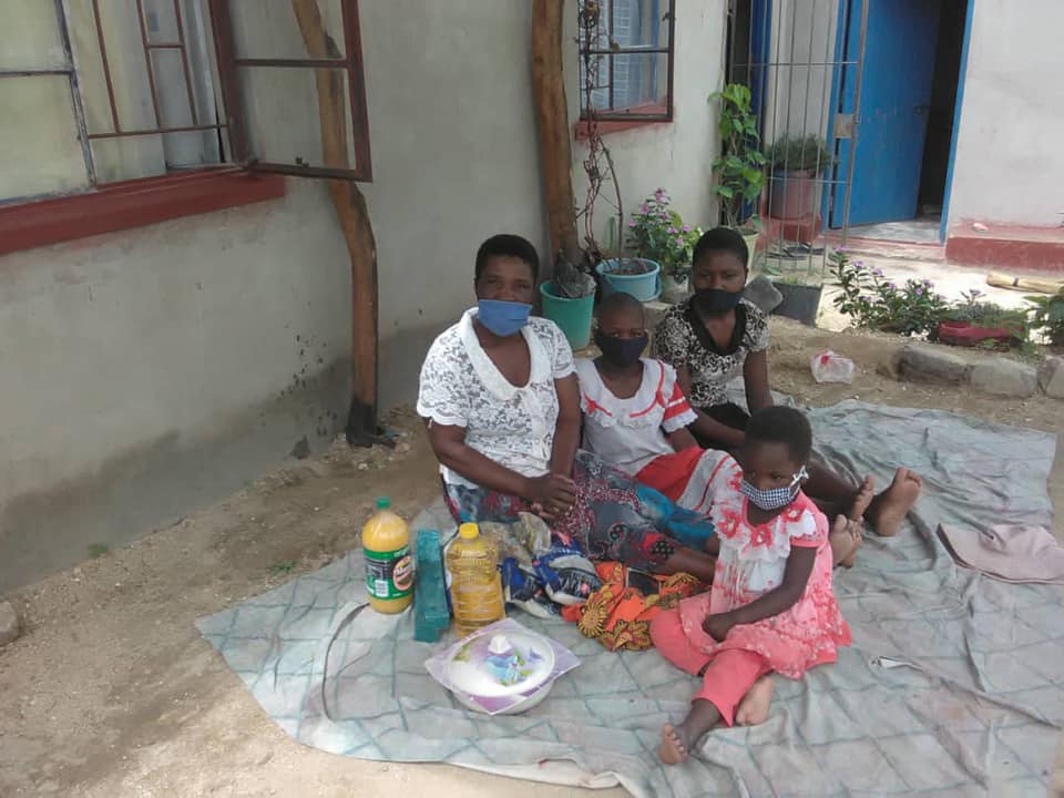 Diapora Insurance donating food to widows4||